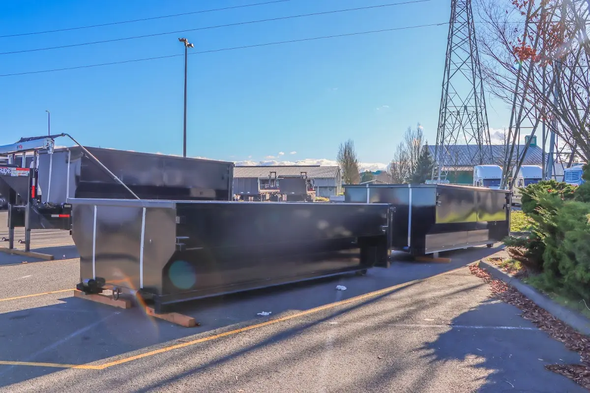 Roll-off dumpster ready for waste disposal at job site for Yard Waste Dumpster Rental in Fort Campbell North